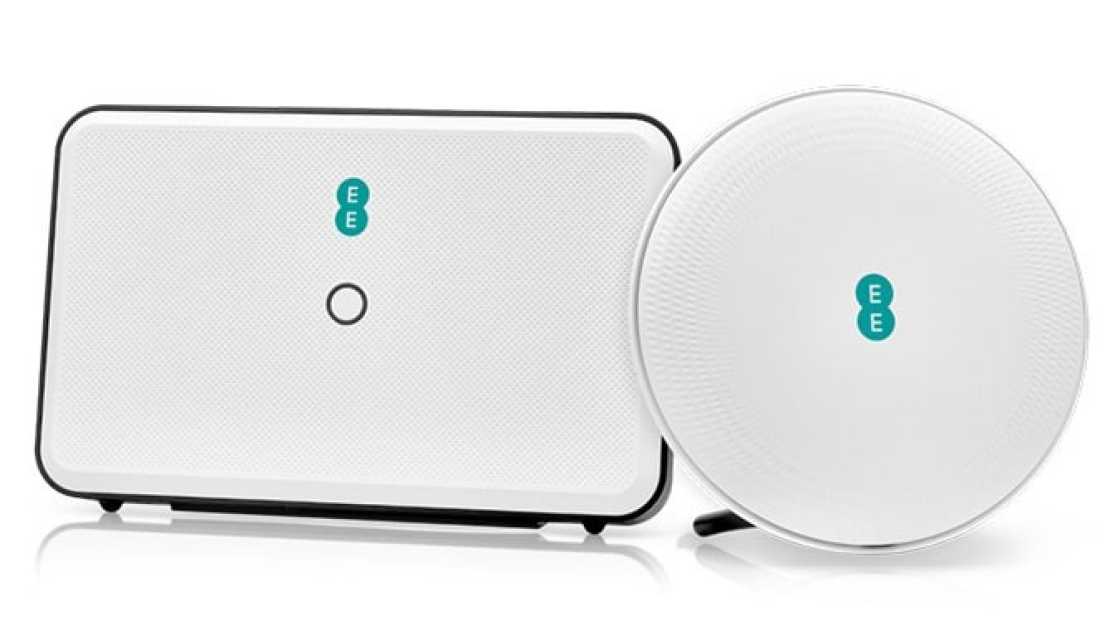 A white EE mobile broadband router next to a WiFi boosting disc